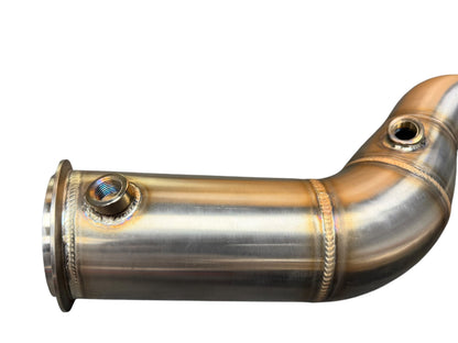 JackSpania Racing downpipe for 2019+ BMW F97 X3M and F98 X4M with S58 3.0T engine, shows the exhaust down pipe part in metallic finish.