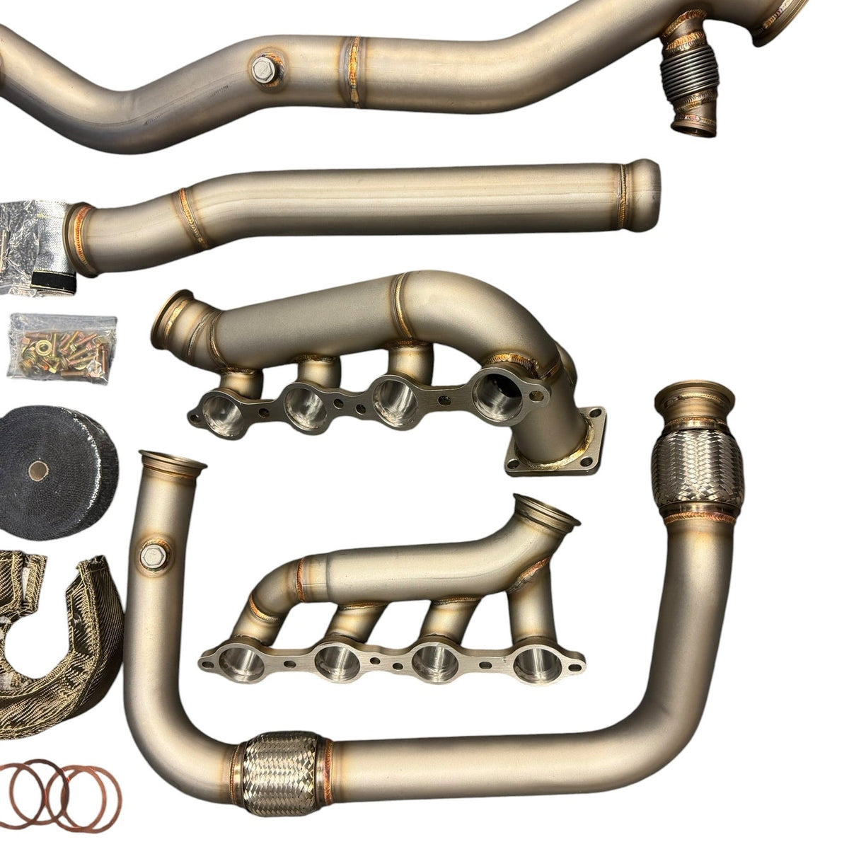 Heavy-duty JackSpania Racing turbo kit for 1999–2013 Chevy Silverado and GMC Sierra LS T4 hot side exhaust system.