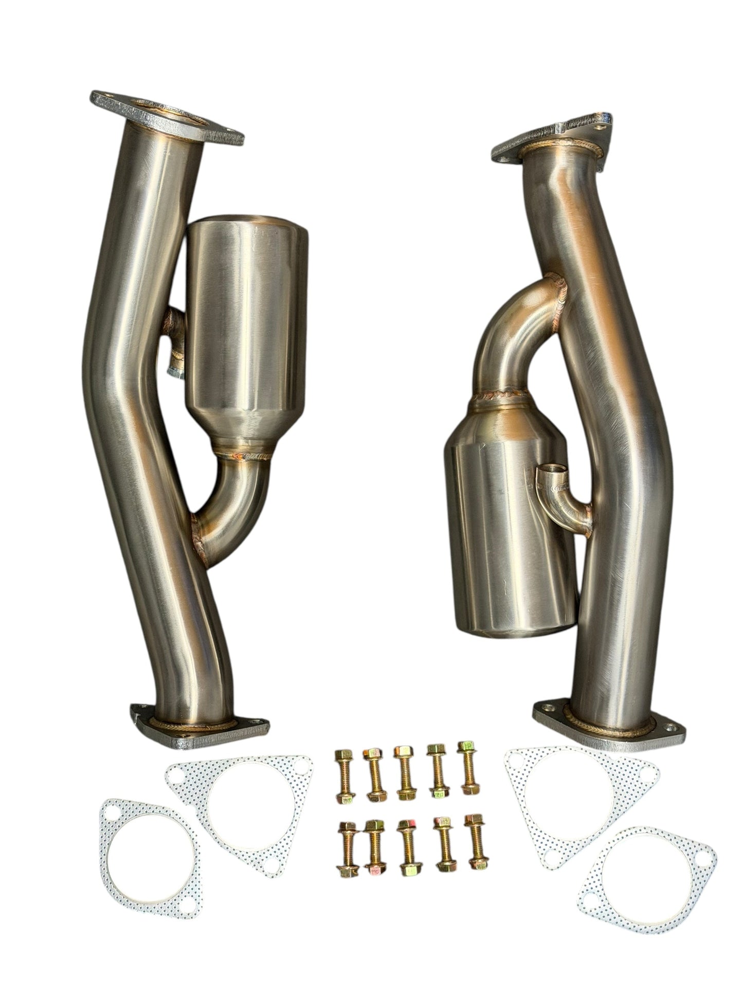 Nissan 350Z/370Z and Infiniti G35/G37 resonated catless Helmholtz downpipe test pipe by JackSpania Racing, showing metal construction and fittings.