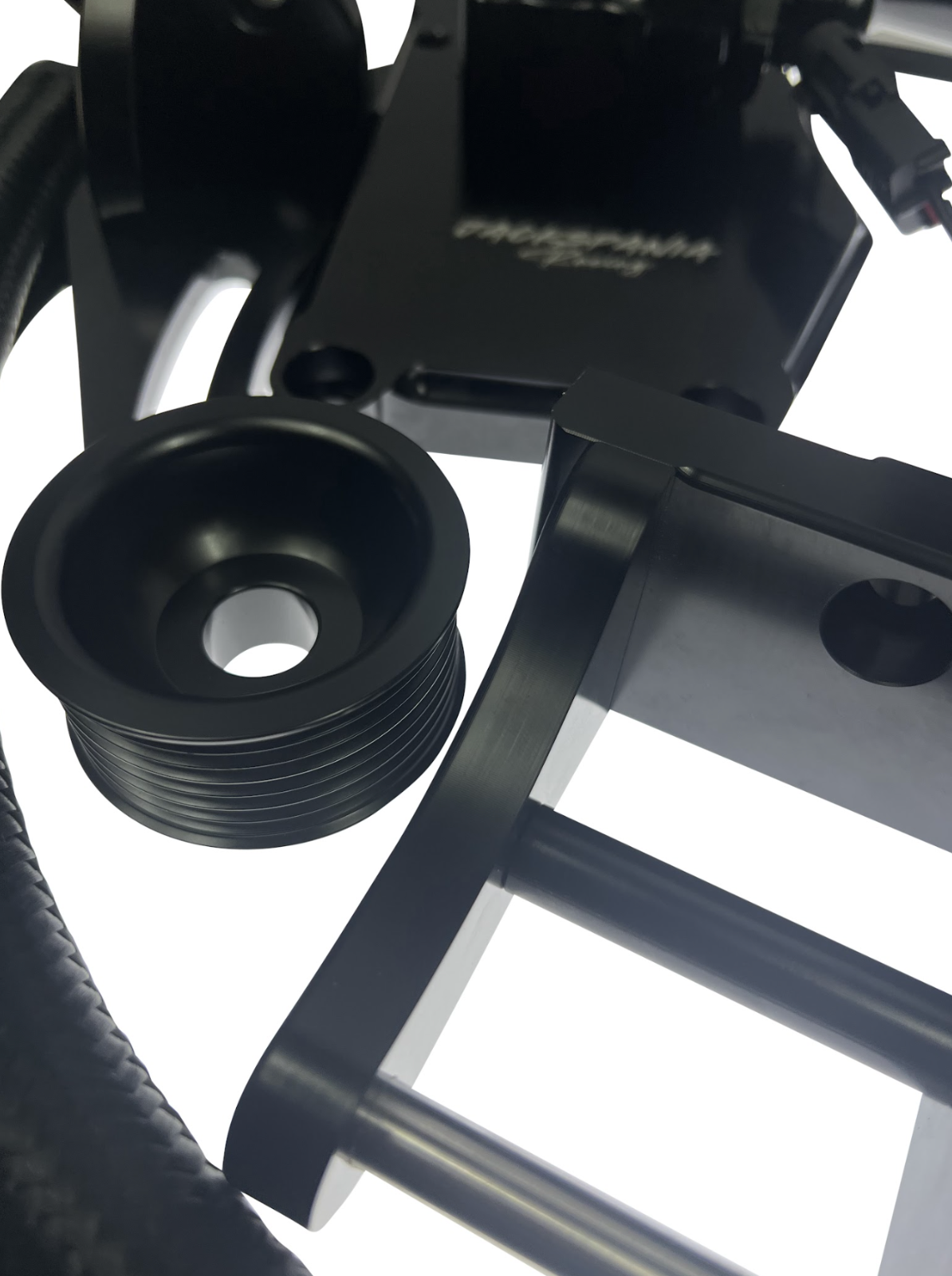 JackSpania Racing billet water pump plate kit for K20 K24 K Series engines, showing the durable aluminum plate with mounting holes.