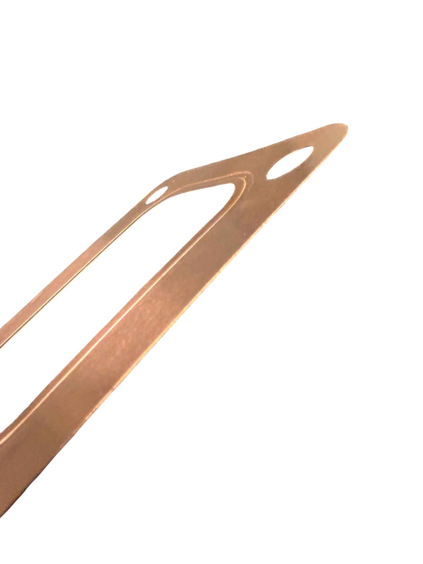 Embossed copper turbo flange gasket for T3, T4, and T6 turbos by JackSpania Racing, showing the detailed textured surface.