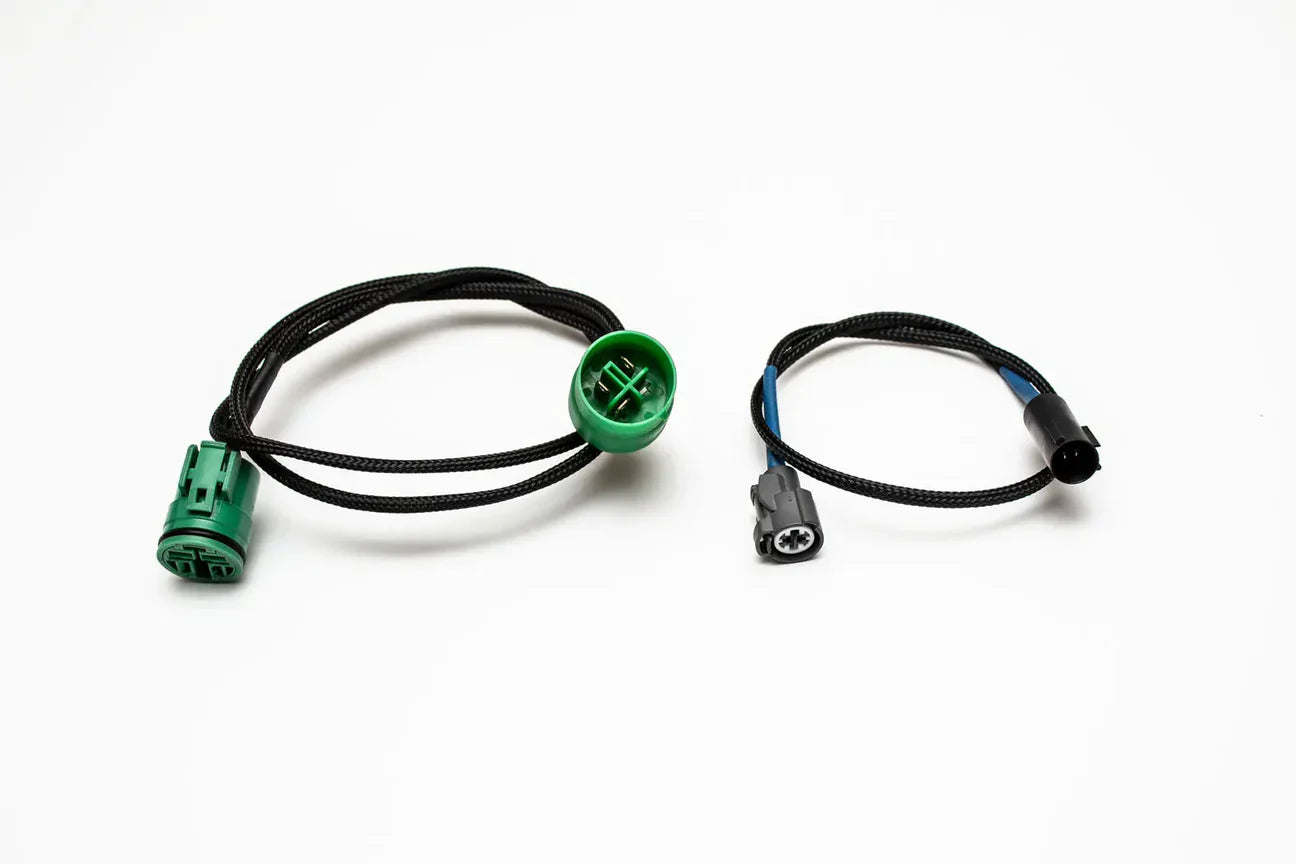 Plug and play B Series to H Series alternator adapter for Honda Acura engines, showing the sturdy wiring loom and connectors.