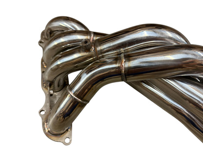 Stainless steel Tri-Y exhaust header for Honda S2000 K-series engine by JackSpania Racing, featuring 2.5-inch collector for AP1 and AP2 models.
