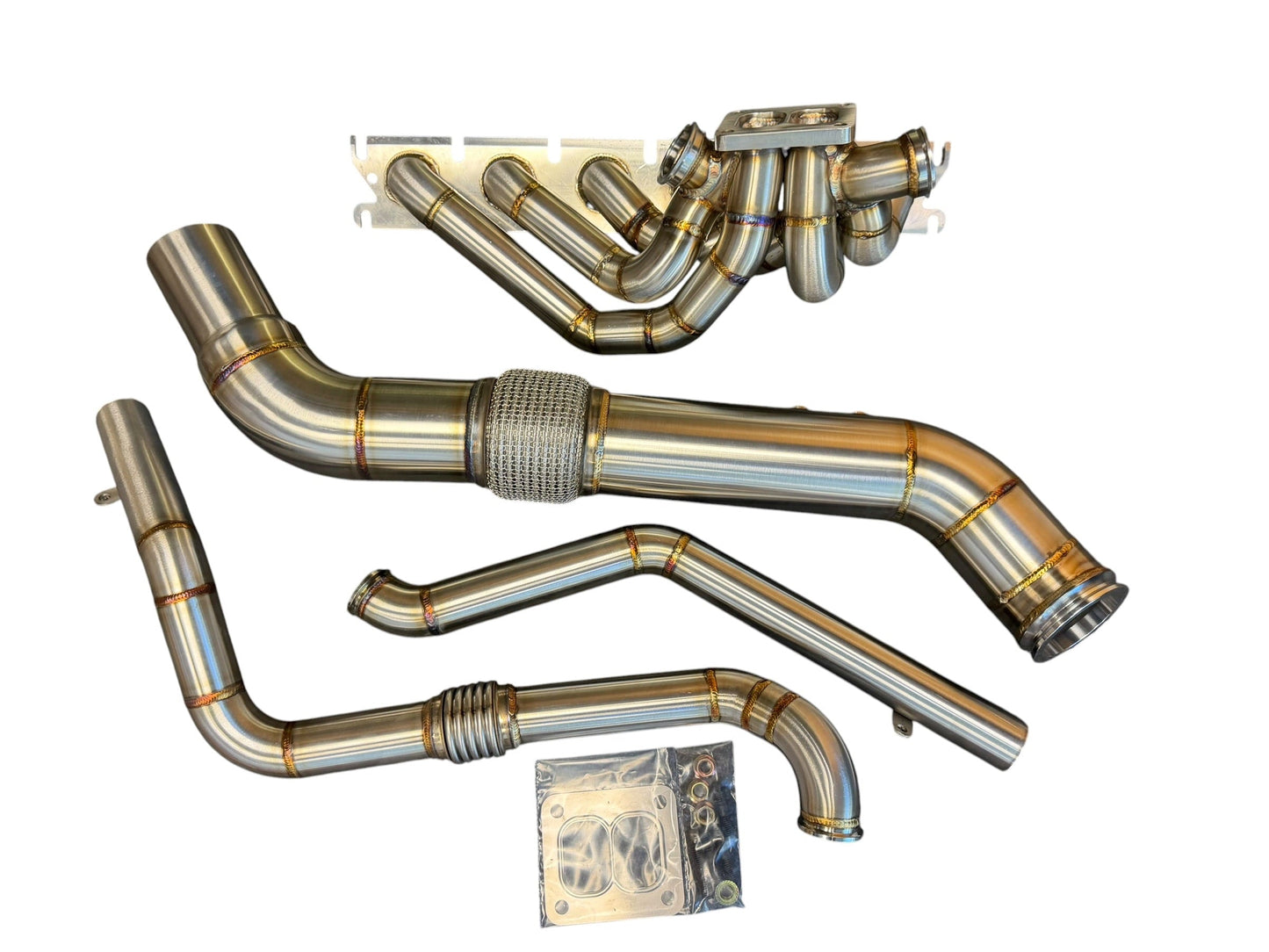 JackSpania Racing B58 Gen 2 6-port turbo hot-side kit for BMW M240i, M340i, M440i, and Toyota GR Supra A90/A91 engine bay