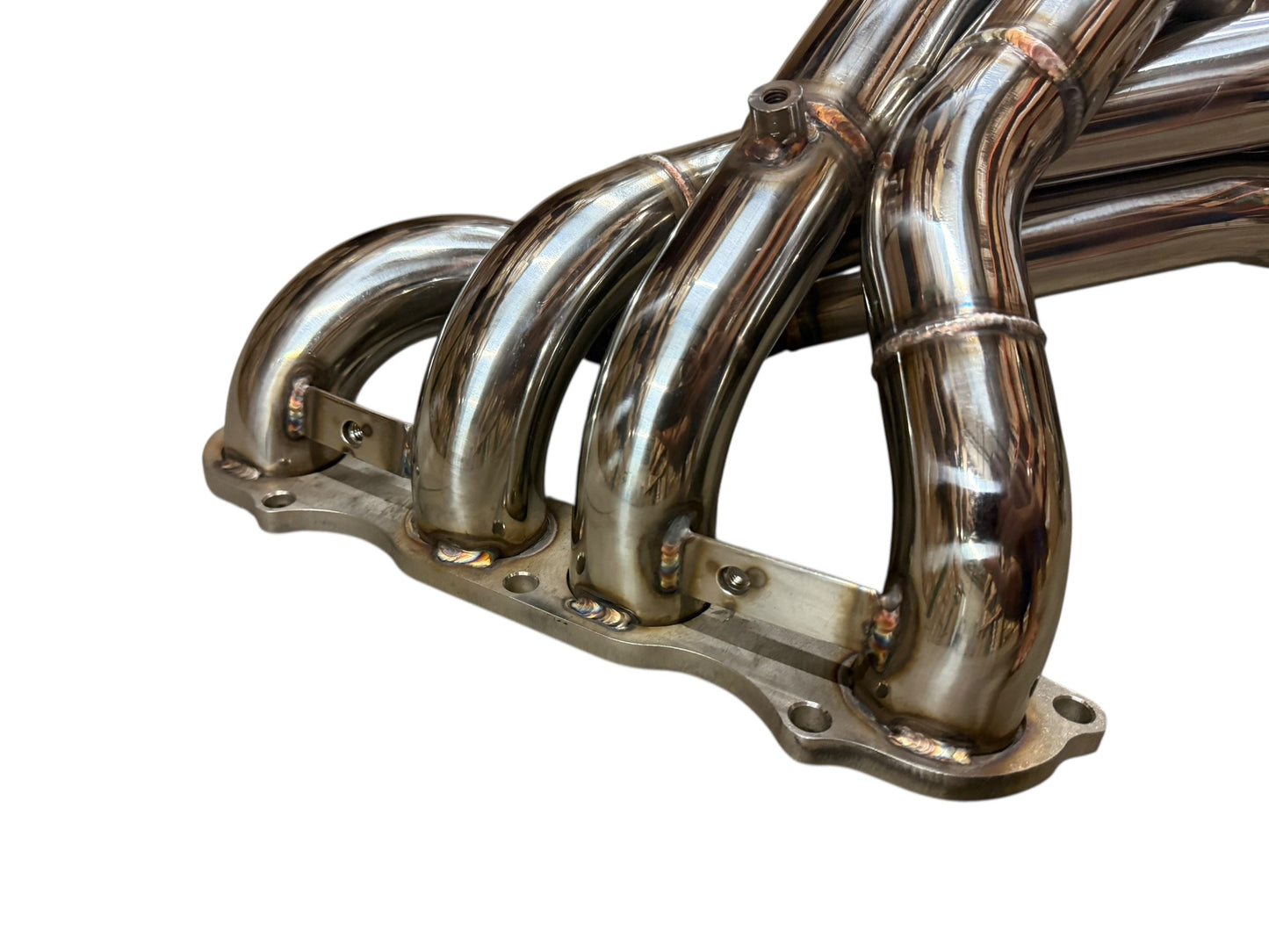 Stainless steel K-series exhaust header with 2.5-inch collector for Honda S2000 K20 K24 engine by JackSpania Racing, detailed metalwork.