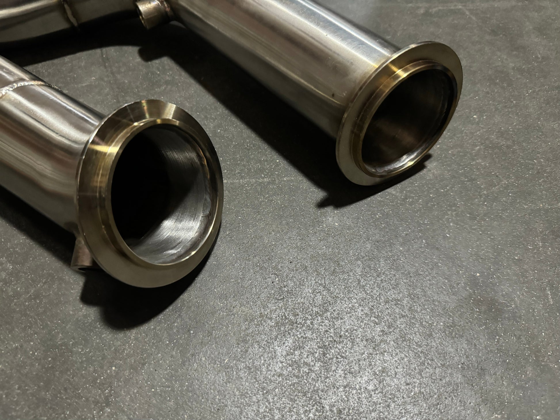 3-inch stainless steel downpipe for BMW S55 F80 F82 F87 M3 M4 F83, exhaust part by JackSpania Racing, shown in image