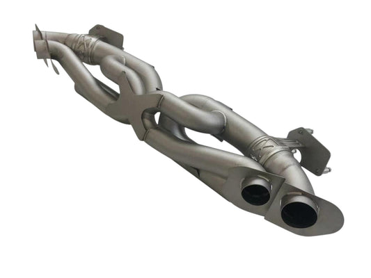 Titanium valved sport exhaust system for Porsche 992 Carrera Turbo by JackSpania Racing, showing polished exhaust pipes and valves.