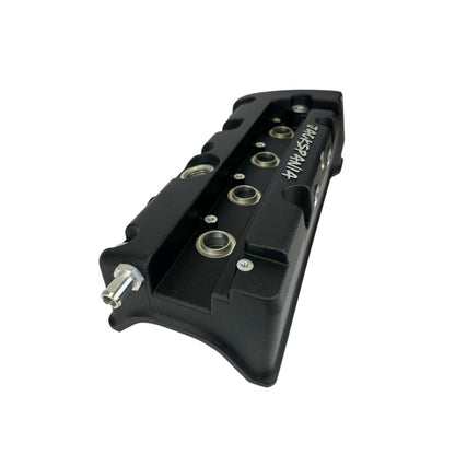 Cast aluminum K Series vented valve cover baffle for Honda Acura K20 K24 engines, featuring AN10 fitting, by Jack Spania Racing.