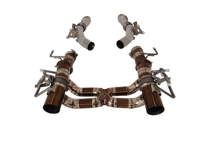 Ferrari SF90 Titanium Valved Exhaust System by JackSpania Racing, showing polished titanium exhaust parts with valves and piping.