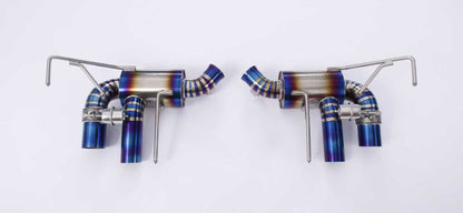Ferrari California 4.3 V8 titanium valved exhaust system by JackSpania Racing, showing polished titanium exhaust pipes and valves.