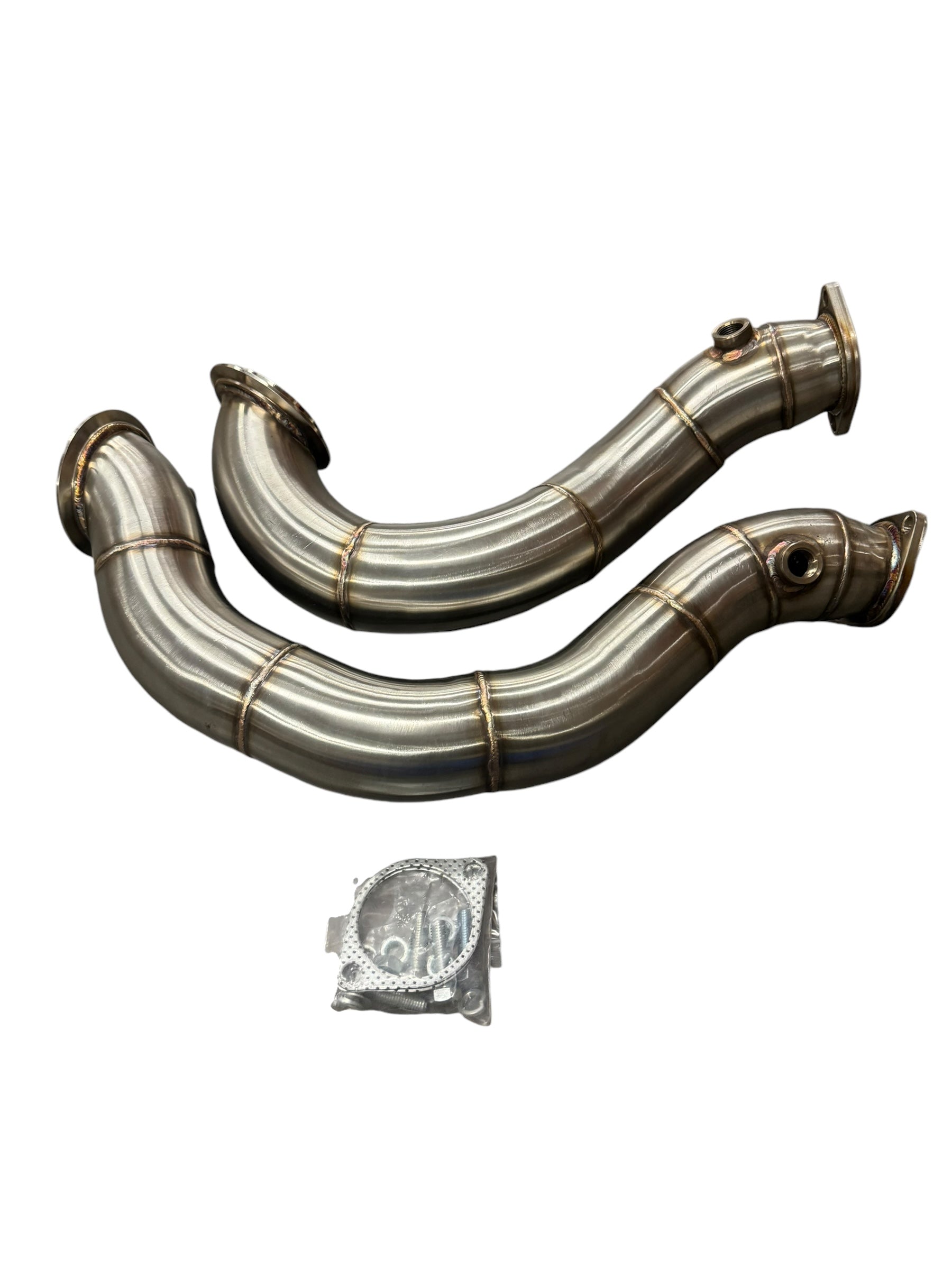 Stainless steel exhaust downpipe for BMW N54 135i 335i E90 E92, 3-inch exhaust pipe by JackSpania Racing, showing polished metal finish.