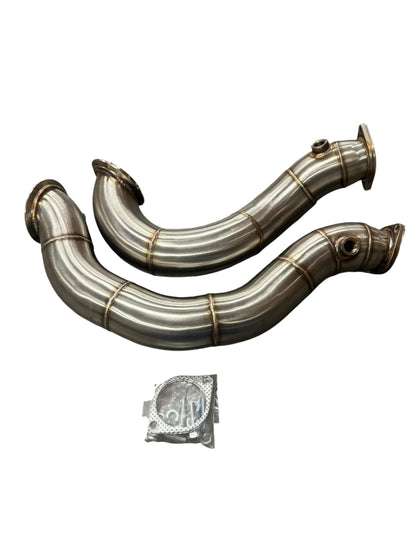 Stainless steel exhaust downpipe for BMW N54 135i 335i E90 E92, 3-inch exhaust pipe by JackSpania Racing, showing polished metal finish.