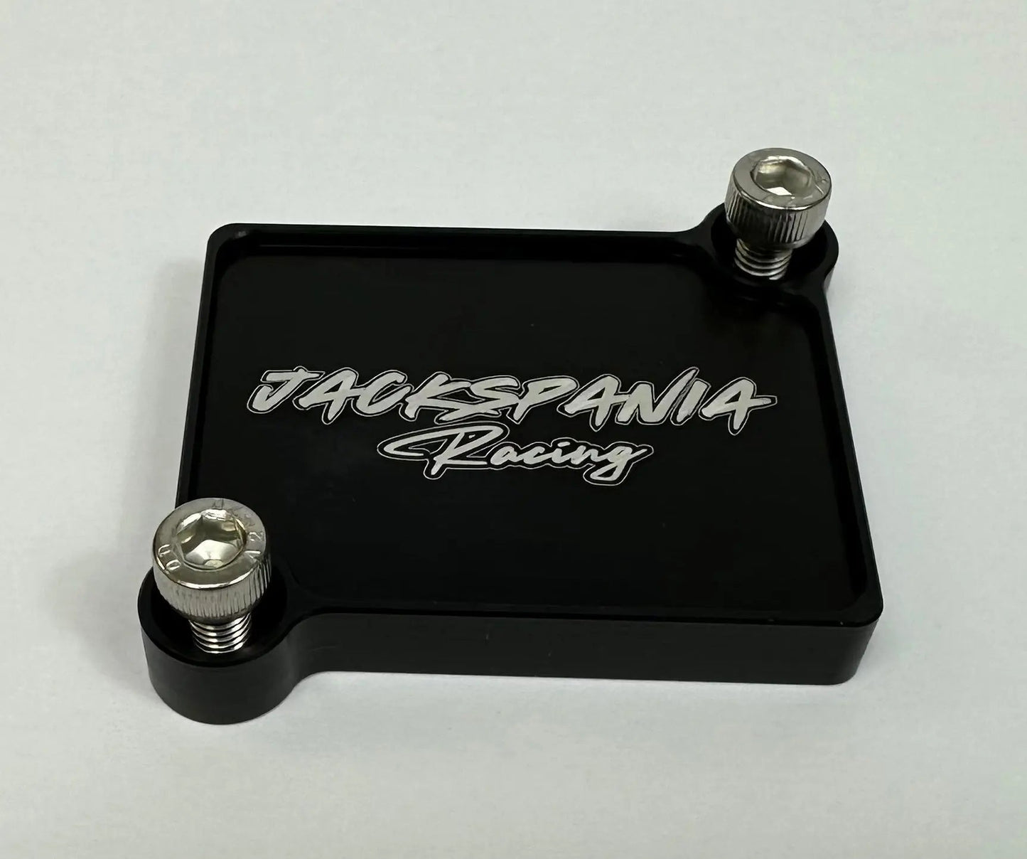 JackSpania Racing K Series engine block off plate installed on a vehicle engine for K series engine parts.