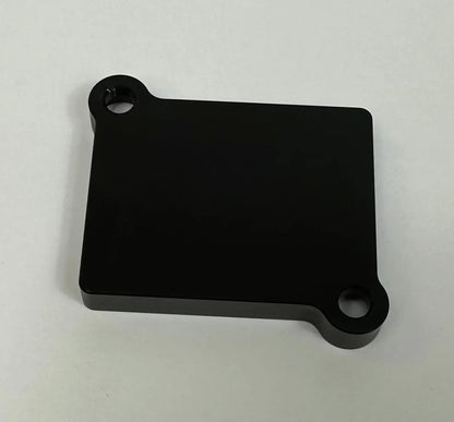 JackSpania Racing K Series engine block off plate for IACV, showing the metal plate with mounting holes on an engine component.