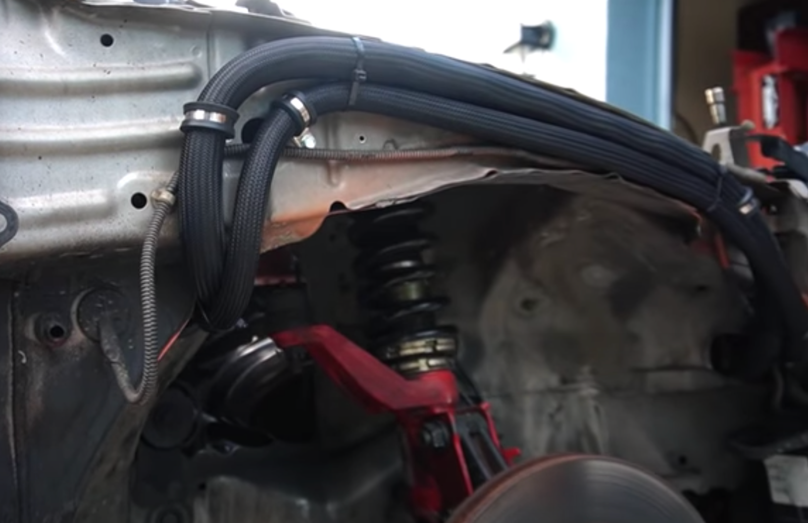Heavy-duty RSX Type S R DC5 AC line tuck kit by Jack Spania Racing for Acura K20 K24 engines, high-pressure engine component upgrade.