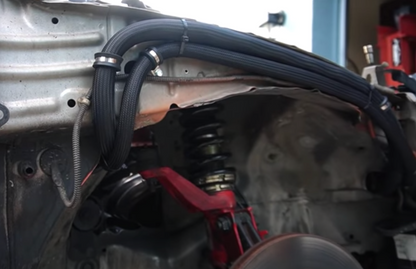 Heavy-duty RSX Type S R DC5 AC line tuck kit by Jack Spania Racing for Acura K20 K24 engines, high-pressure engine component upgrade.