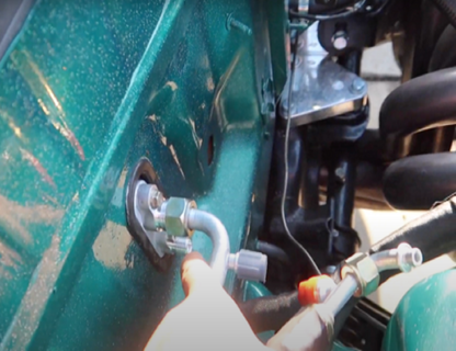 Honda Acura Integra K20 K24 engine AC line tuck kit by Jack Spania Racing, showing the compact, routed AC lines and fittings.