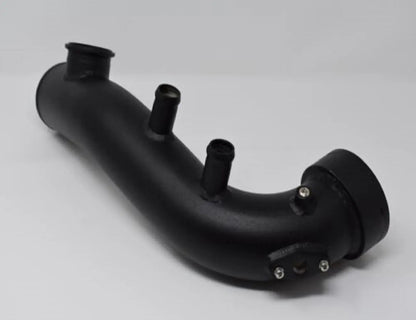 BMW N54 charge pipe kit with blow-off valve from Jack Spania Racing, installed in E90 335i engine with visible piping and fittings