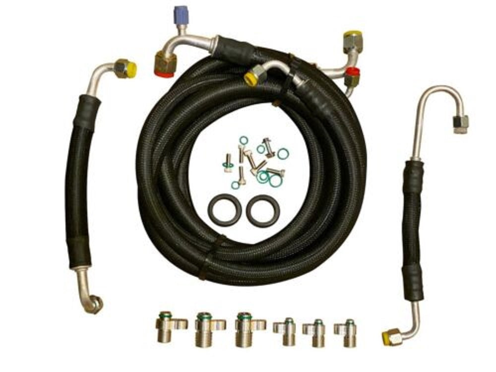 Jack Spania Racing D Series AC Line Tuck Kit installed in Honda Civic Si or Acura Integra DC2 engine, showing neatly routed AC lines.