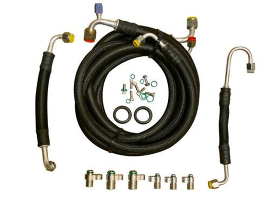 Jack Spania Racing D Series AC Line Tuck Kit installed in Honda Civic Si or Acura Integra DC2 engine, showing neatly routed AC lines.