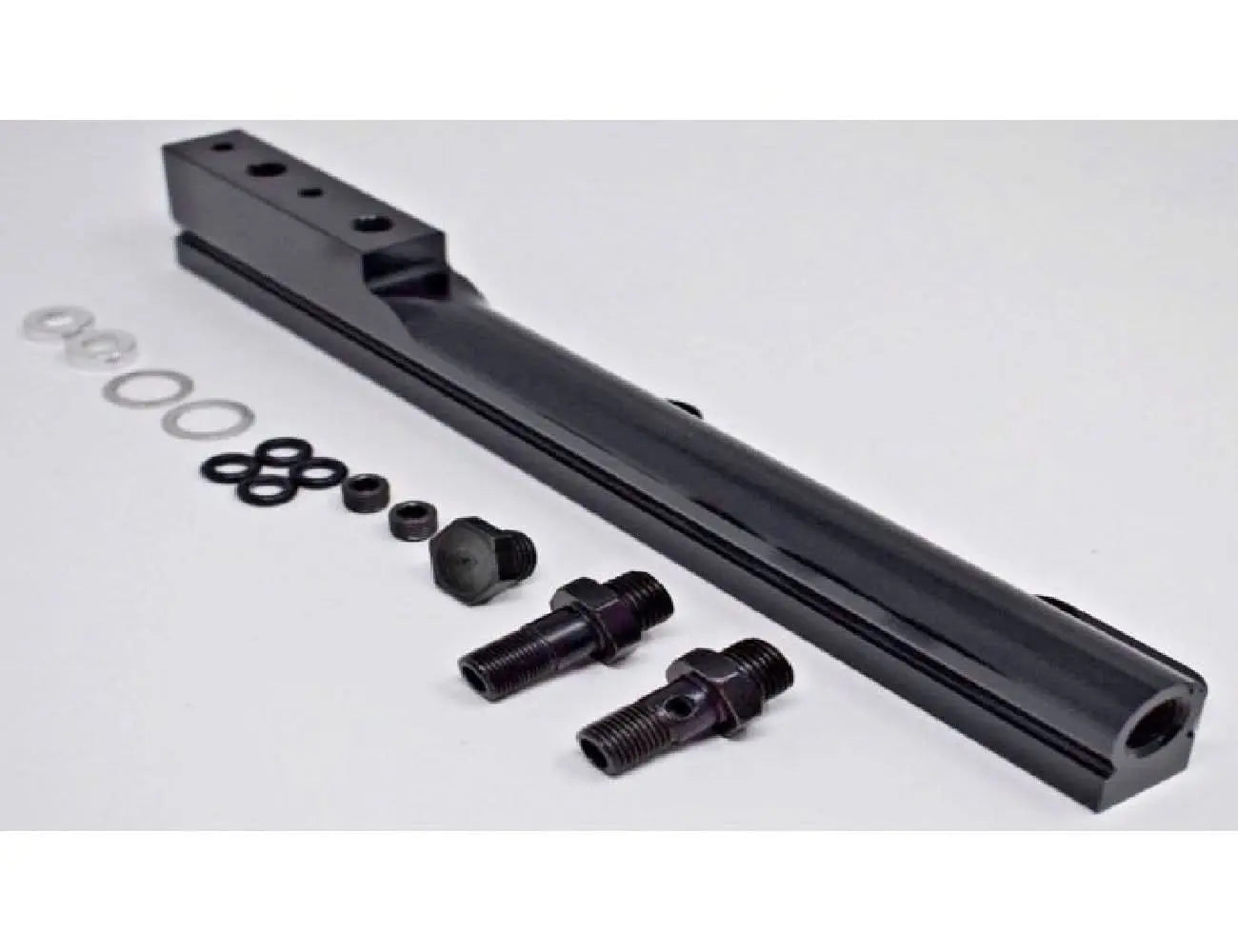 Jack Spania Racing D Series fuel rail for Honda Civic Si, Integra, and CRX non-VTEC engine parts, shown mounted on engine.