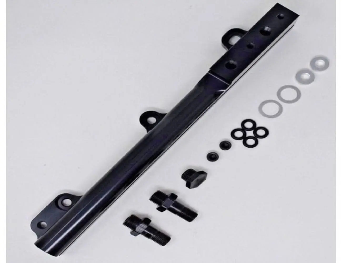 Jack Spania Racing D Series fuel rail for Honda Civic Si, Integra, and CRX non-VTEC engine parts, shown mounted on engine.