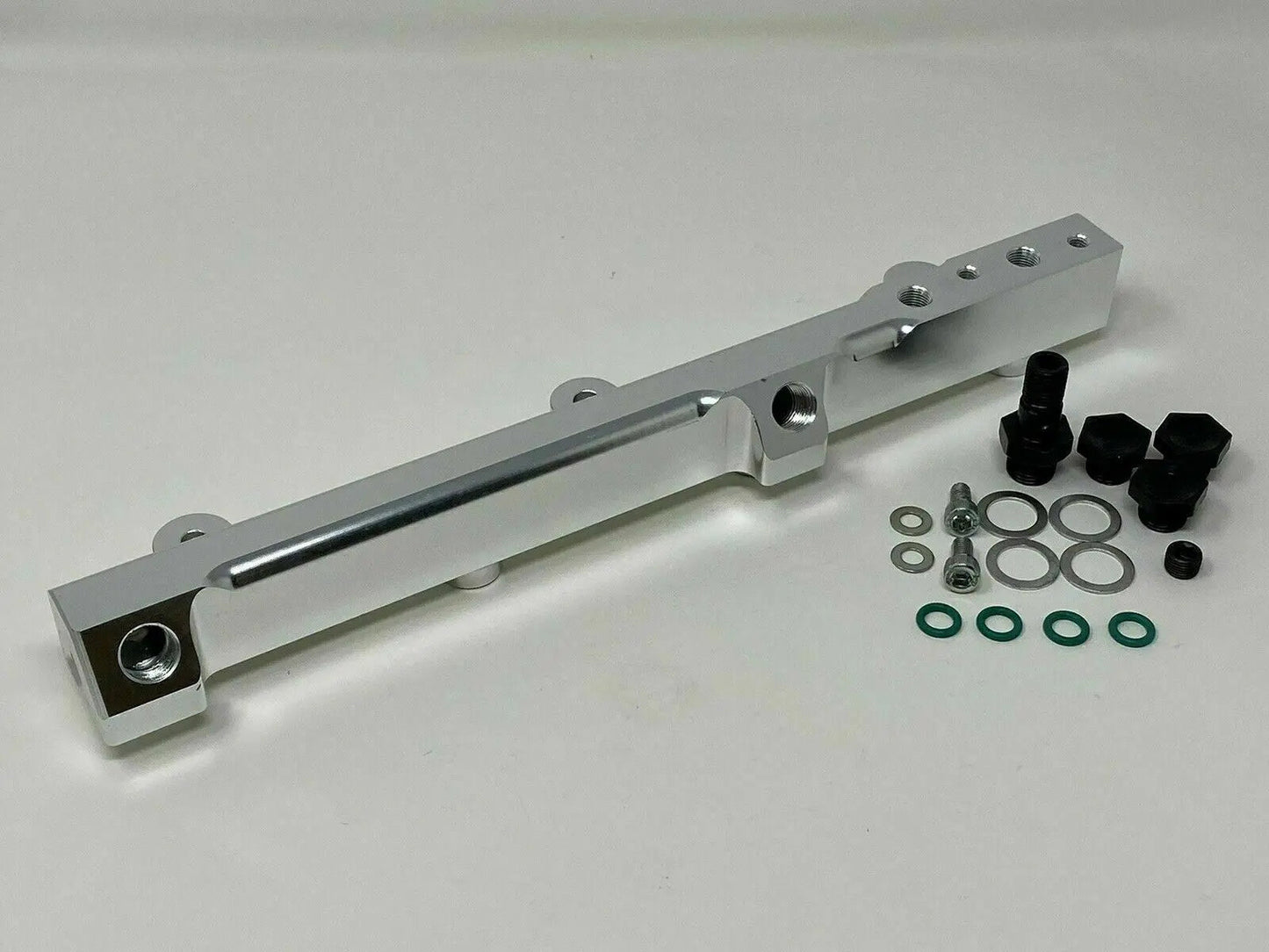 High flow fuel rail for Honda Prelude H22 H23 and Accord F22, by Jack Spania Racing, showing the polished engine part.
