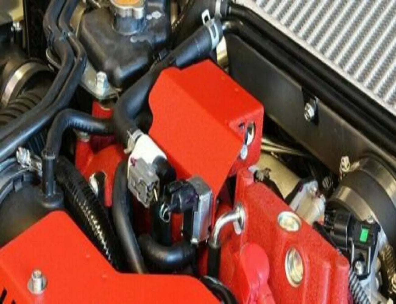 Aluminum Boost Solenoid Cover by Jack Spania Racing for Subaru WRX Impreza STi 2008+ engine parts, featuring a sleek metallic finish.