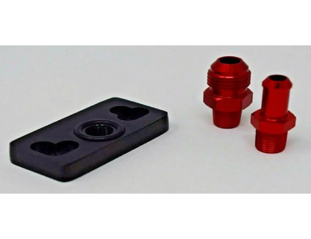 Fuel pressure regulator rail adapter riser for Honda Acura Civic Integra Crx engines, by Jack Spania Racing, shown installed on engine.