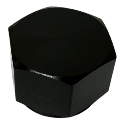 Black aluminum 10AN flare cap block for coolant, air, fuel, and oil lines, designed for engine applications by JackSpania Racing.