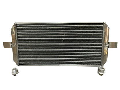 Full size tucked radiator for Honda Acura B Series K Series engines by Jack Spania Racing, with 16AN shroud and engine parts.