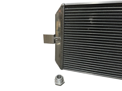 Full size tucked radiator for Honda Acura B Series and K Series engines by Jack Spania Racing, with 16AN shroud, engine cooling part.