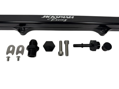 Six-an and eight-an billet CNC fuel rail for Honda and Acura K Swap engines, by Jack Spania Racing, mounted on engine components.