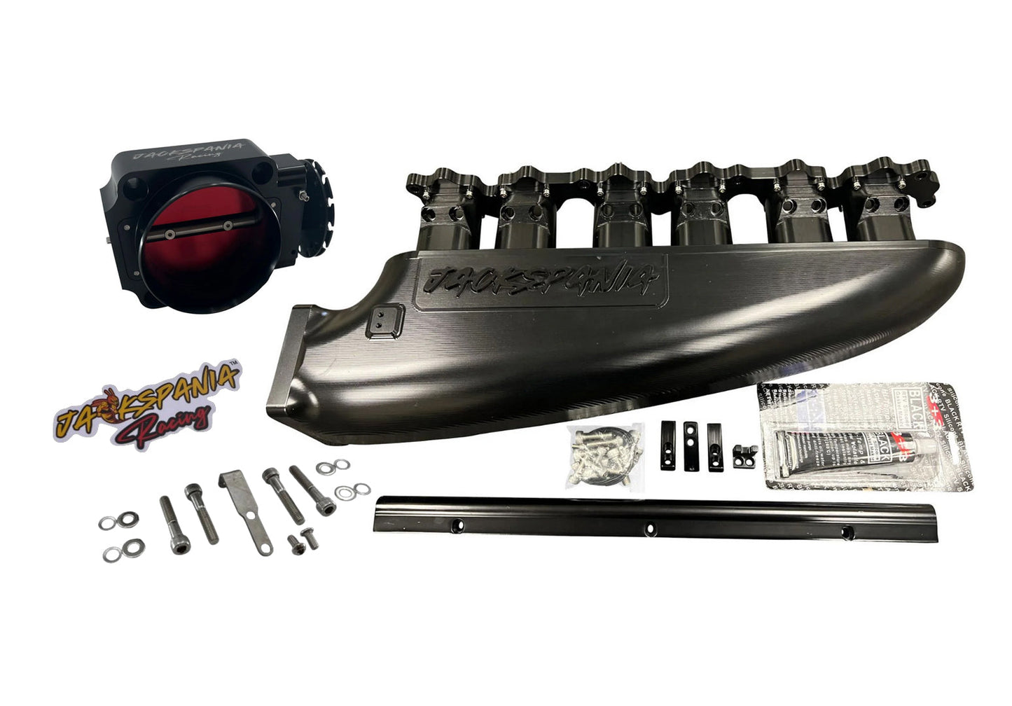 Fully billet 2JZ GTE intake manifold with 12 injector fuel rail and throttle body for high-performance engine by Jack Spania Racing.