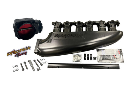 Fully billet 2JZ GTE intake manifold with 12 injector fuel rail and throttle body for high-performance engine by Jack Spania Racing.
