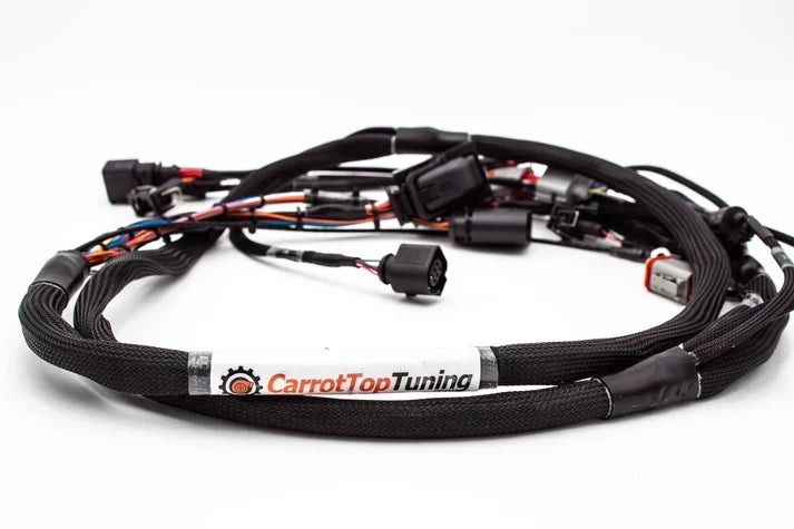 JackSpania Racing 1.8T OEM+ ME7.5 40-pin engine harness for VW Beetle 2000-2010, featuring narrowband and wideband ECU connectors.