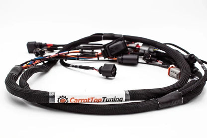 JackSpania Racing 1.8T OEM+ ME7.5 40-pin engine harness for VW Beetle 2000-2010, featuring narrowband and wideband ECU connectors.