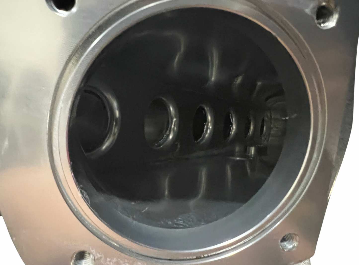 BMW E36 E46 M50 M52 M54 intake manifold and throttle body engine parts by Jack Spania Racing, showing the polished metal components.