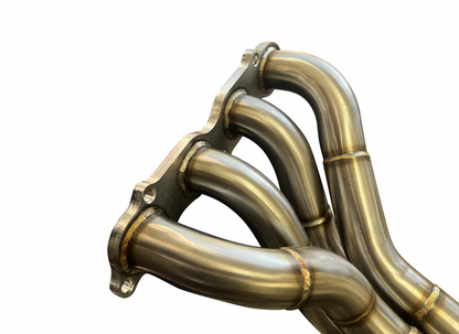 Jack Spania Racing K-Series race header for Honda RSX EP3 Type S with K20 and K24 engine, showing polished metal construction.