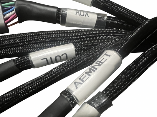 JackSpania Racing Plug & Play Jumper Harness for AEM Infinity ECUs, engine parts, with connectors and wiring for easy installation.