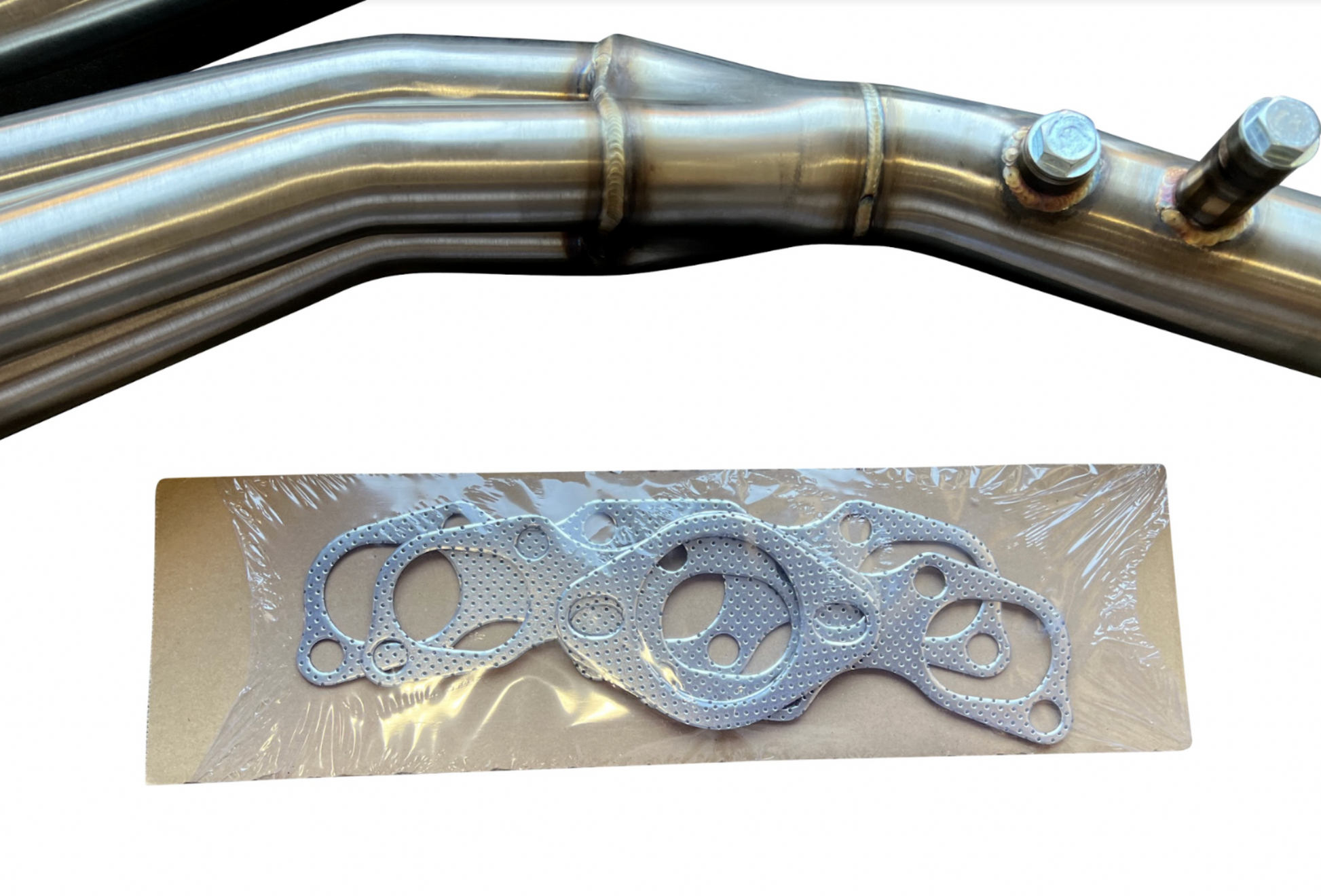 Stainless steel long tube headers for Nissan VQ35DE engines, compatible with 350Z, 370Z, G35, G37, by JackSpania Racing.