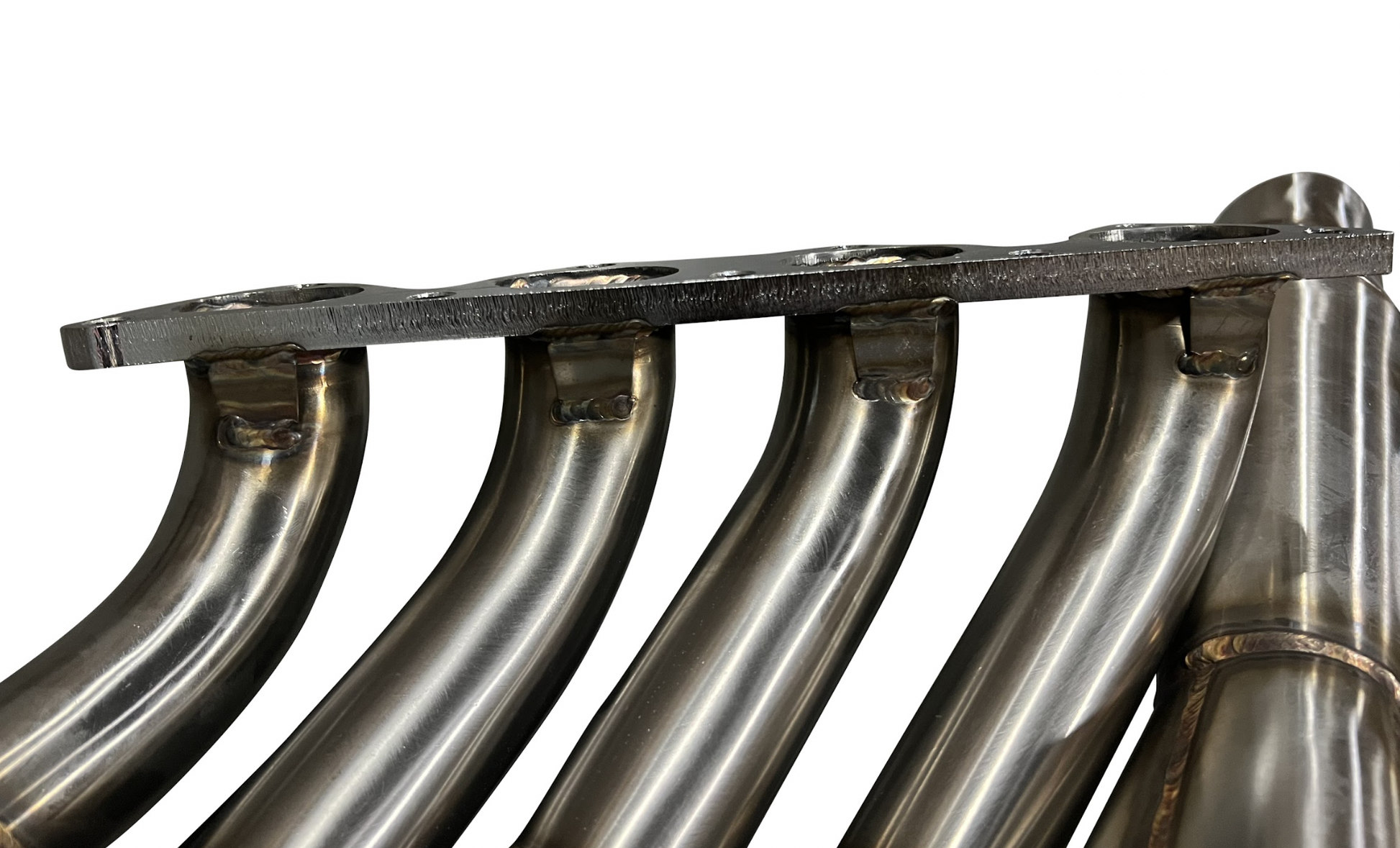 Honda Acura B Series 4-1 hood exit race header by Jack Spania Racing, showing the polished exhaust manifold with pipe connections.