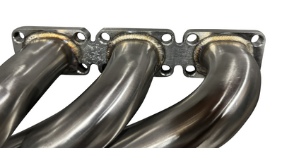 BMW E39 E46 Z3 headers for M54 engine by JackSpania Racing, showing stainless steel exhaust manifold components.