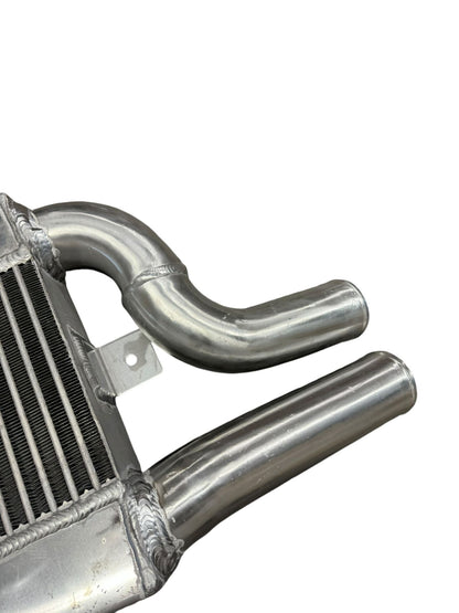 JackSpania Racing K Series Vertical Flow Intercooler for Honda K20, K24 engines, compatible with Acura swaps, high-performance engine part.
