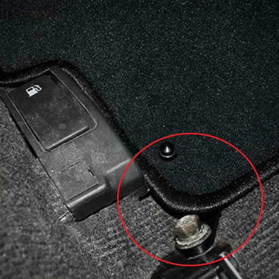 Driver side carpeted floor mat retention bracket for Subaru WRX and STi, designed by JackSpania Racing, interior car accessory.