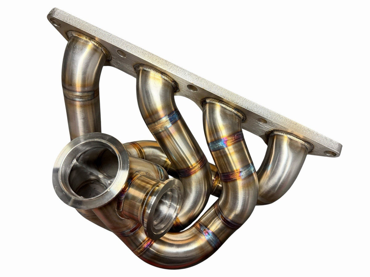 JackSpania Racing 316SS tubular turbo manifold for Evo 7-9 with 44mm wastegate, V-band, compatible with G25 G30 turbos.