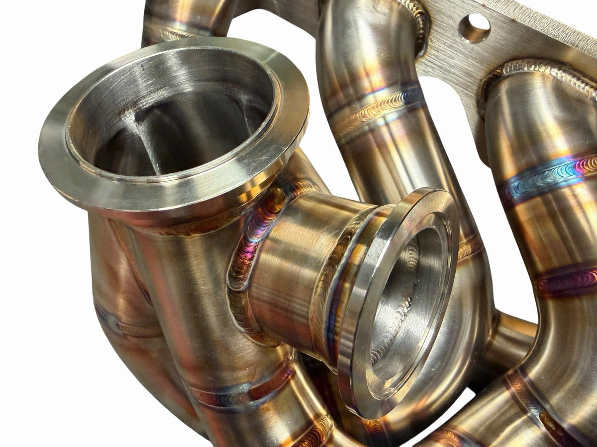 JackSpania Racing 316SS tubular turbo manifold for Evo 7-9 with 44mm wastegate and V-band for G25 G30 turbochargers
