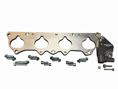 JackSpania Racing K24 intake manifold adapter kit for S2000 F20C F22C engines, showing the metal adapter components.