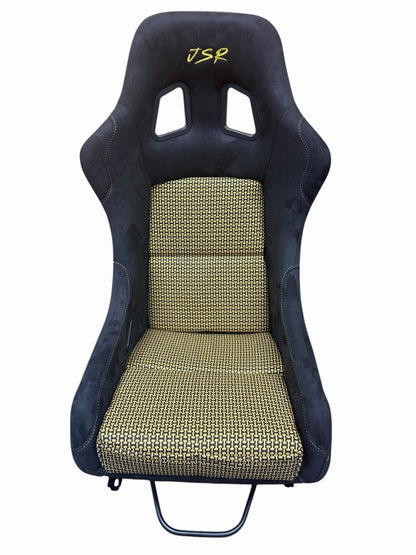 JackSpania Racing universal lightweight fixed bucket seat with suede upholstery, mounted on rails with sliders for interior racing car setup.