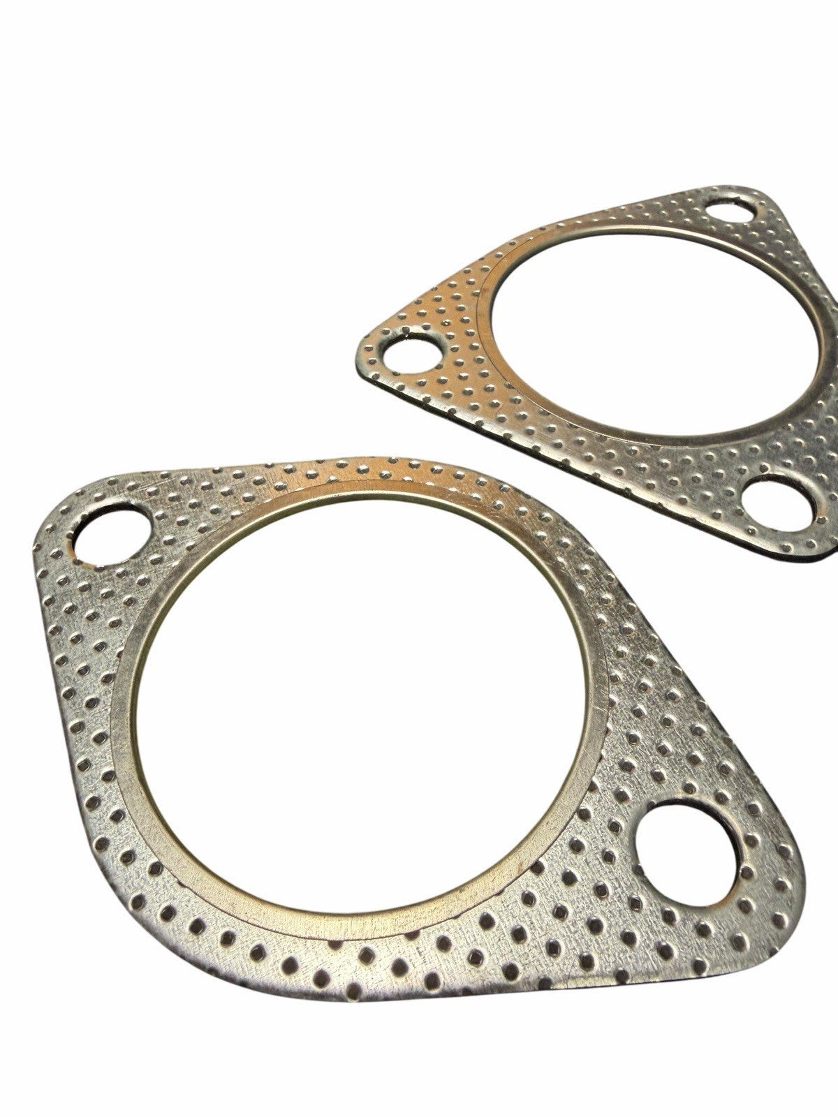 Four JackSpania Racing G35 350Z catalytic converter gaskets for Nissan and Infiniti DE engine exhaust system.